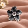 Adjustable Flower Ring with elegant floral design, brass construction, premium polish and stylish fashion jewelry